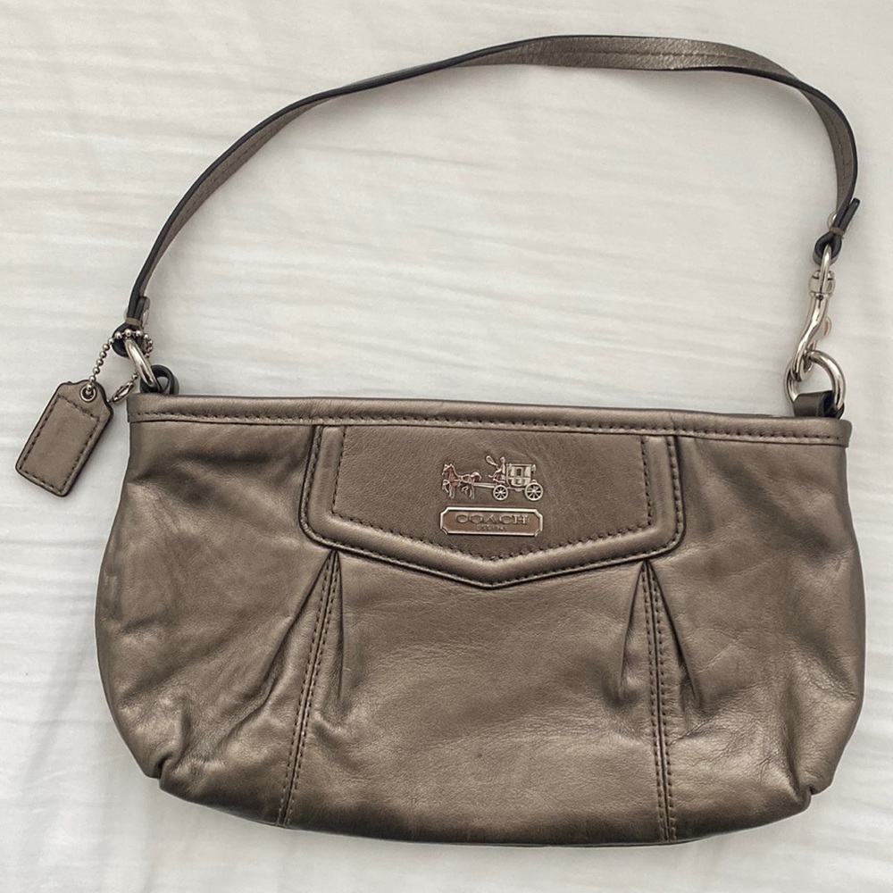 Metallic coach wristlet